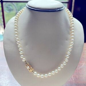 Mikimoto 18k gold pearl necklace. Length 19”. Pearls 6-6.3 mm